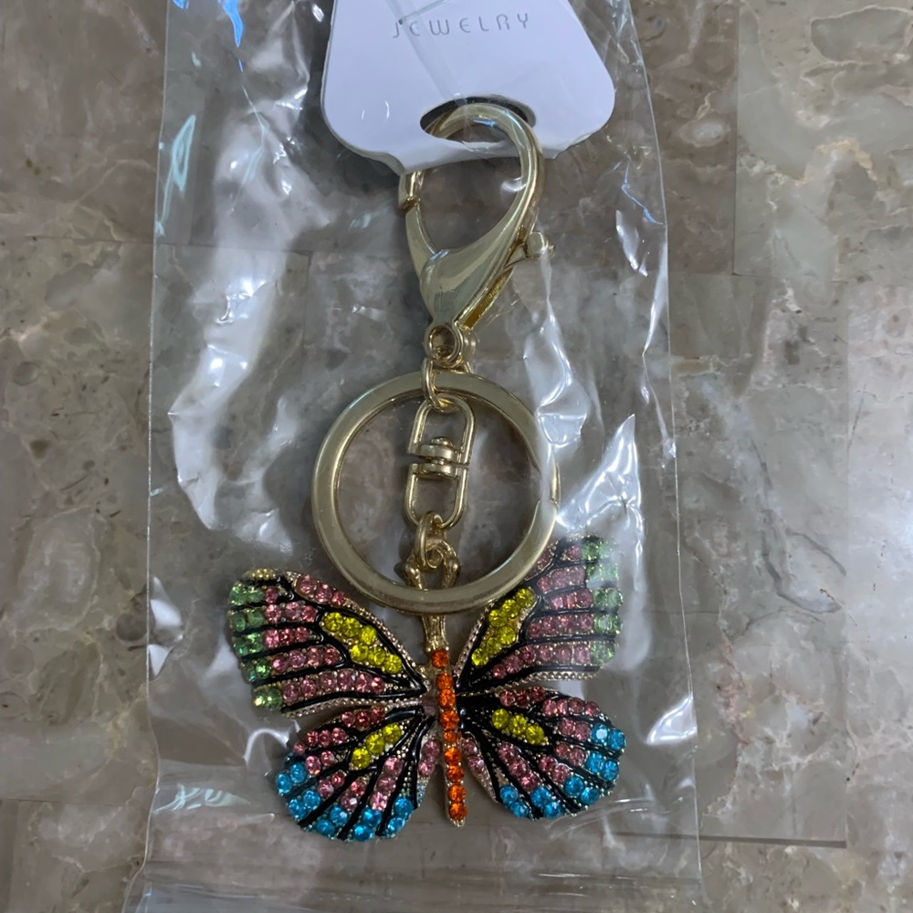 New multicolored butterfly bag charm.